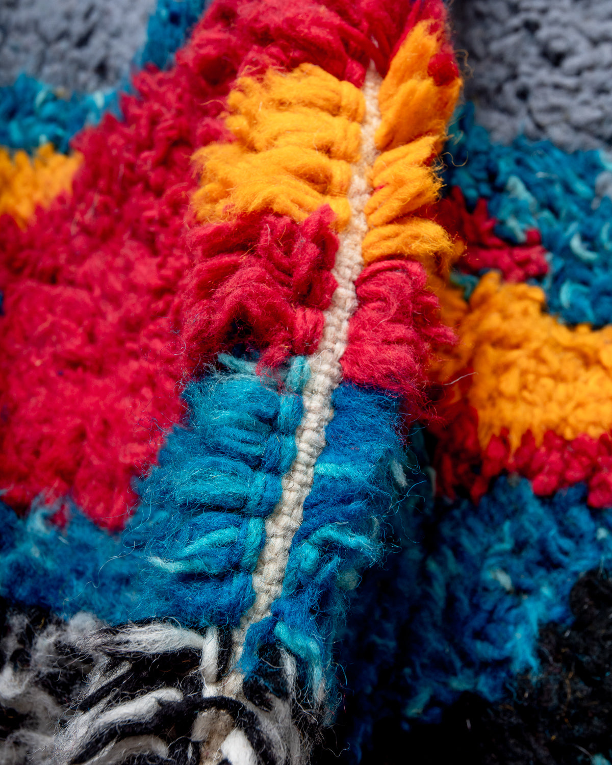 Modern, designer, handcrafted Berber rug from Morocco. Beniourain carpet with beautiful colours and patterns and fluffy wool texture.